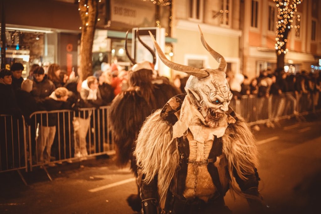 people-in-krampus-costumes-during-a-nighttime-parade-0rha53i7lfe